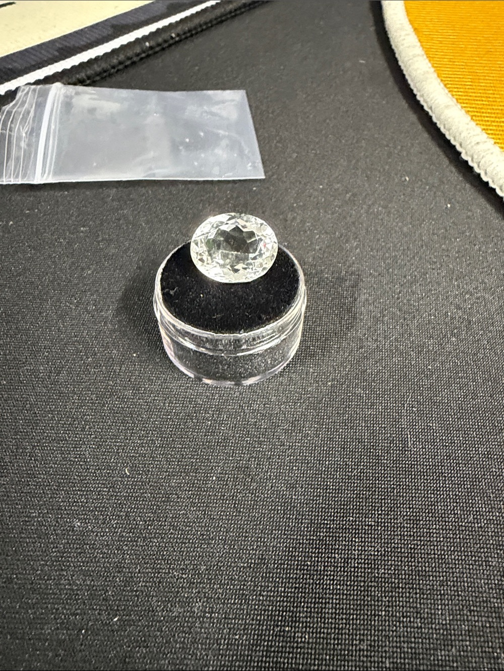 Clear Decorative Gem, it is either a white topaz or a white sapphire. 10.25 CT